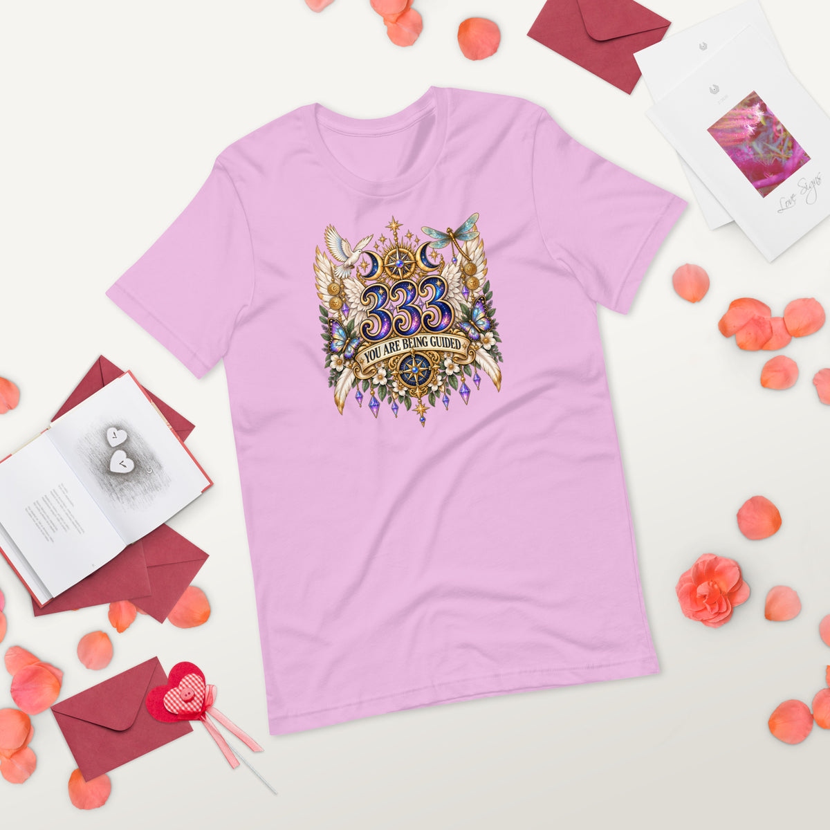 333 You Are Being Guided angel number design, a white dove, angel wings, a dragonfly and a compass rose, on a lilac unisex t-shirt, front view, alternate shot