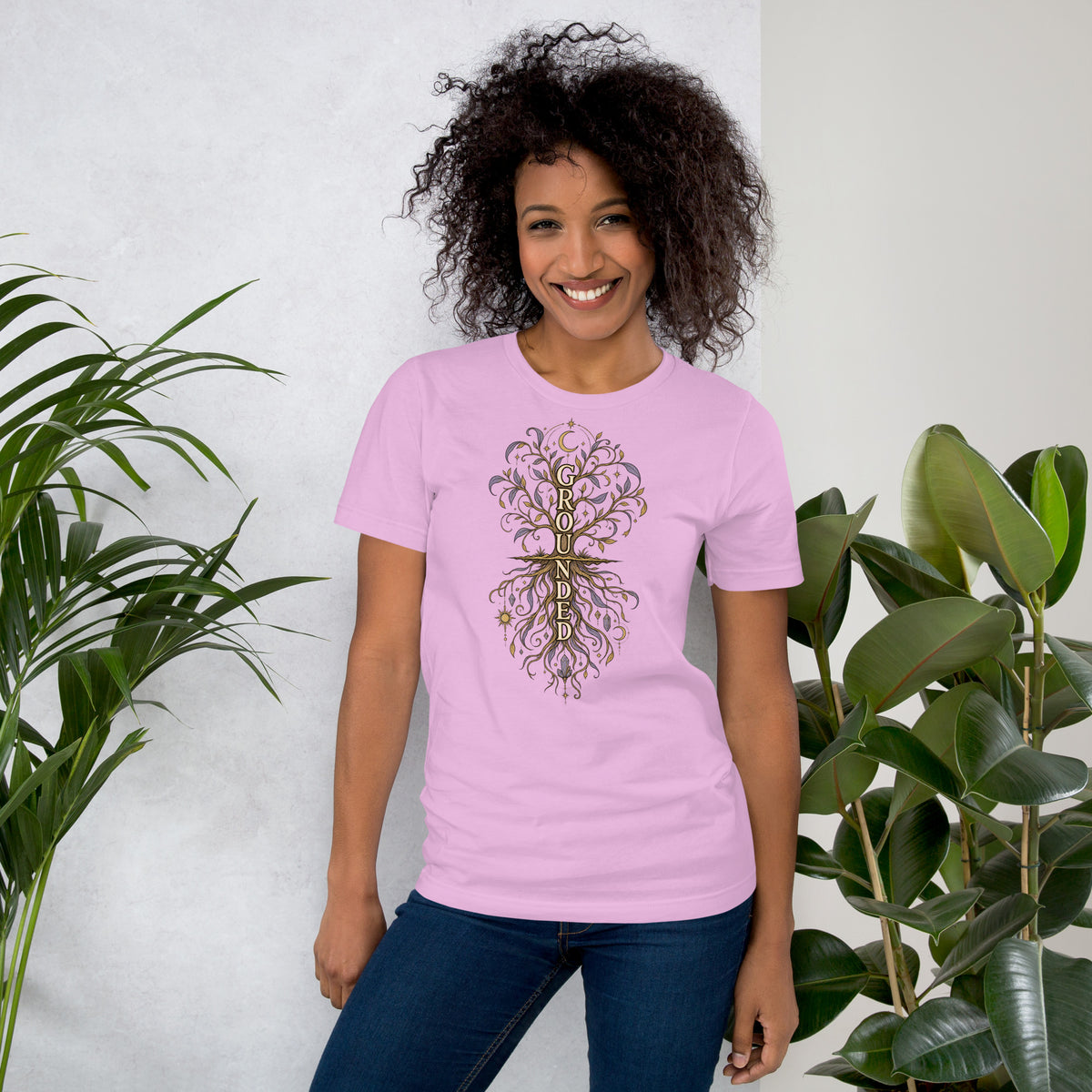 Own Your Grounded Energy design, an ornate tree with gold leaves and crystals in its roots, on a lilac unisex t-shirt, front view