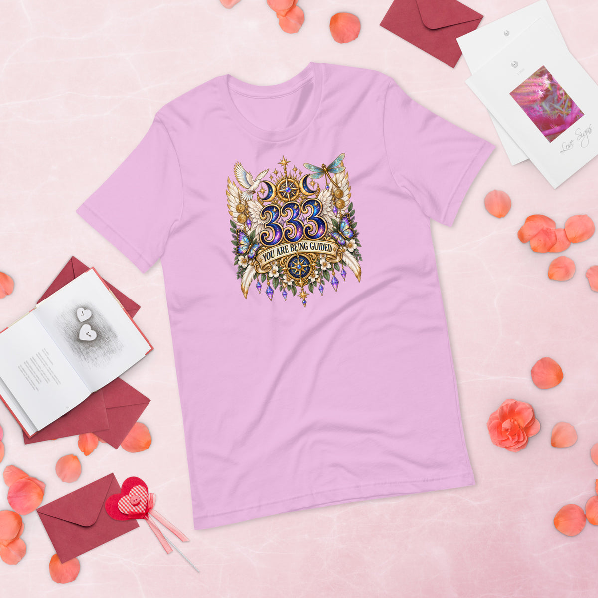 333 You Are Being Guided angel number design, a white dove, angel wings, a dragonfly and a compass rose, on a lilac unisex t-shirt, front view