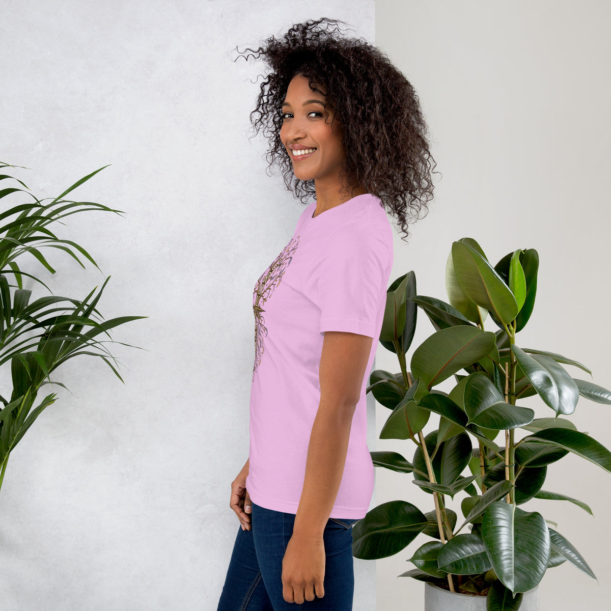 Own Your Grounded Energy design, an ornate tree with gold leaves and crystals in its roots, on a lilac unisex t-shirt, left side view