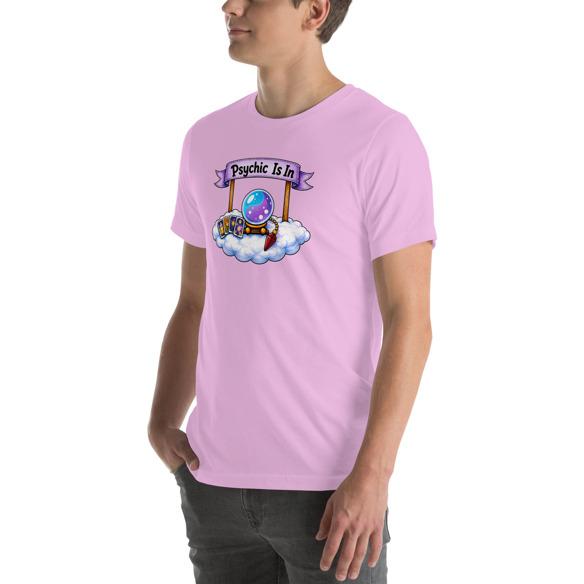 Psychic Is In design, playful floating clouds beneath a banner that reads Psychic Is Open for Business, on a lilac unisex t-shirt, angled left front view