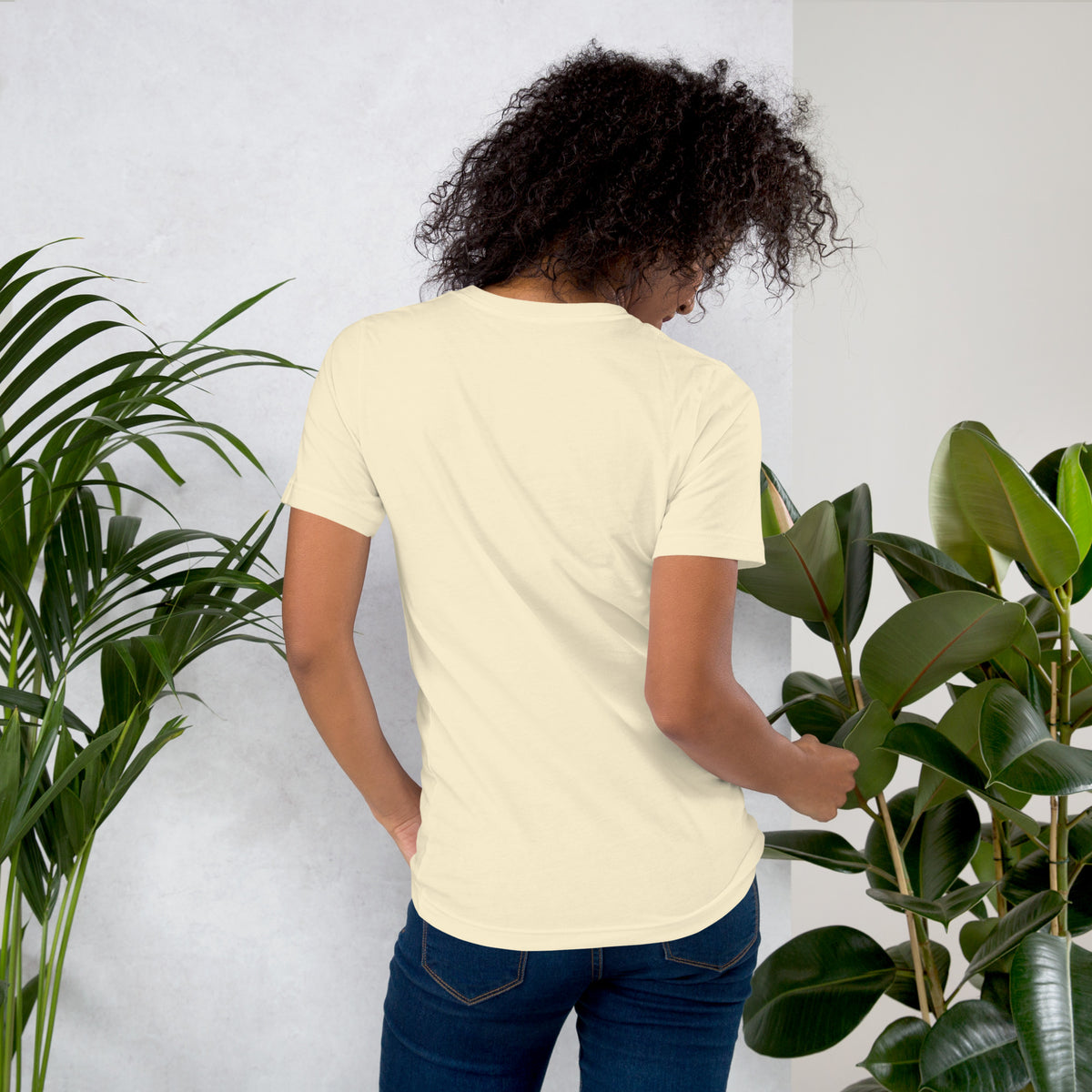 My Apothecary Has Trust Issues, a witchy black cat and a cabinet of potion bottles, on a natural unisex t-shirt, back view