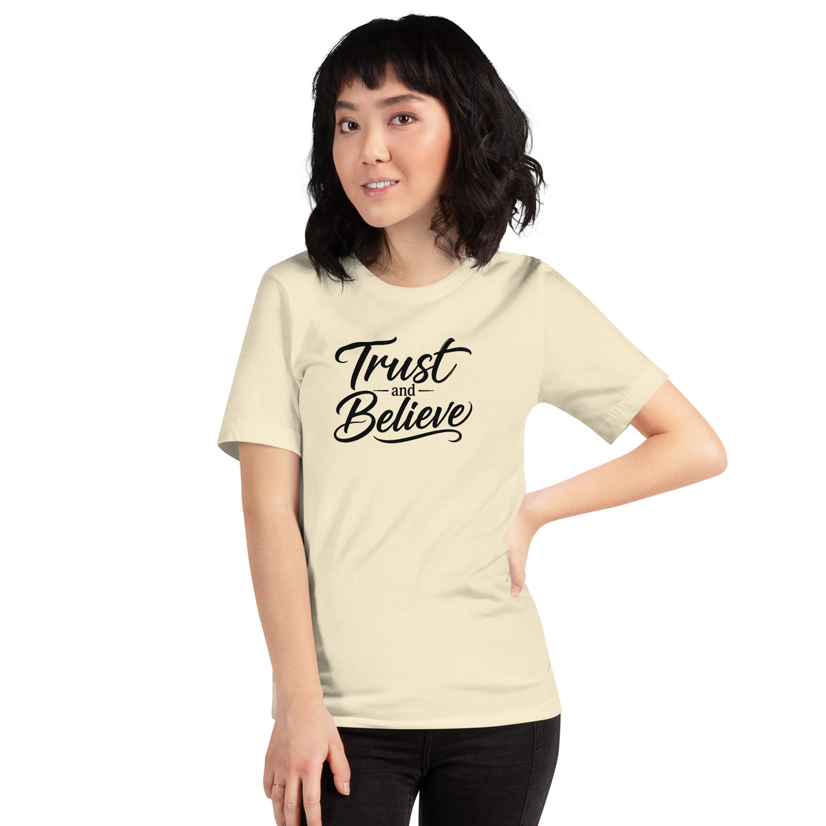 Trust and Believe design in black lettering, on a natural unisex t-shirt, front view