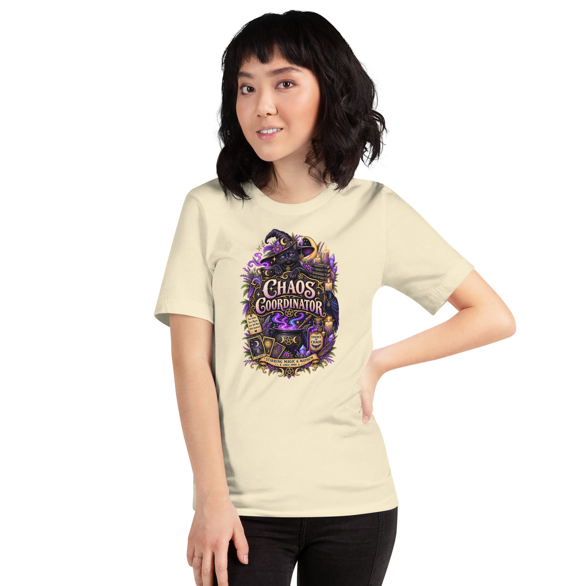 Chaos Coordinator whimsigoth design, a witchy black cat in a pointed hat, on a natural unisex t-shirt, front view