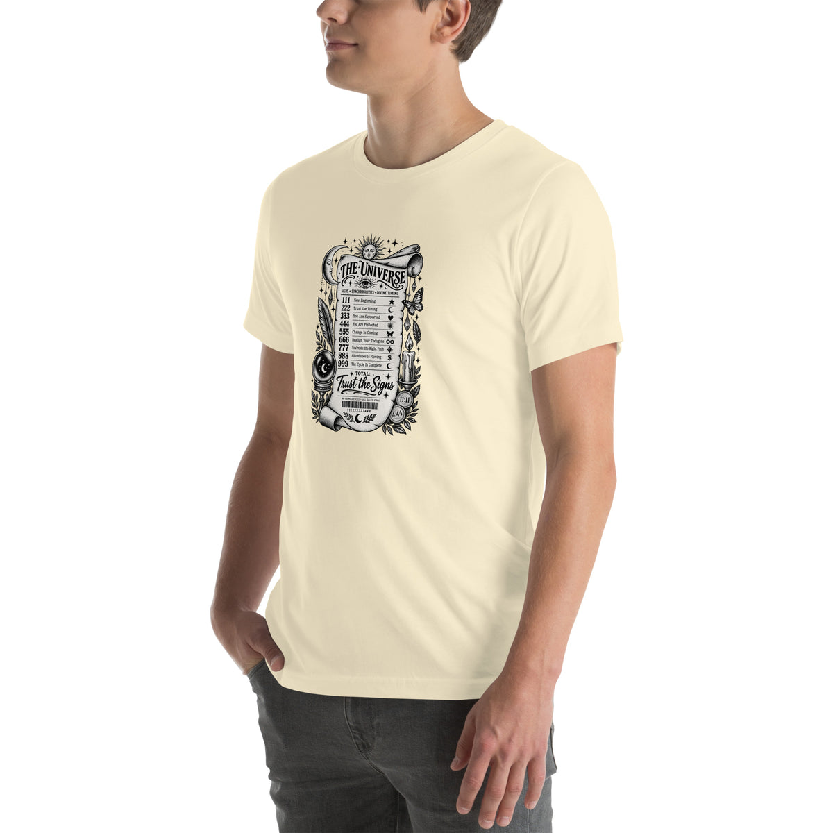 Trust the Signs design, a receipt from the Universe listing the angel numbers and their meanings, with a crystal ball and a candle, on a natural unisex t-shirt, angled left front view