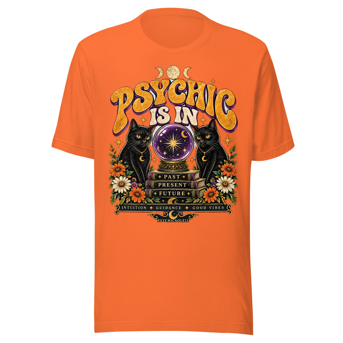 Retro Psychic Is In unisex t-shirt in orange, front. Two black cats and a purple crystal ball in retro seventies bubble lettering.