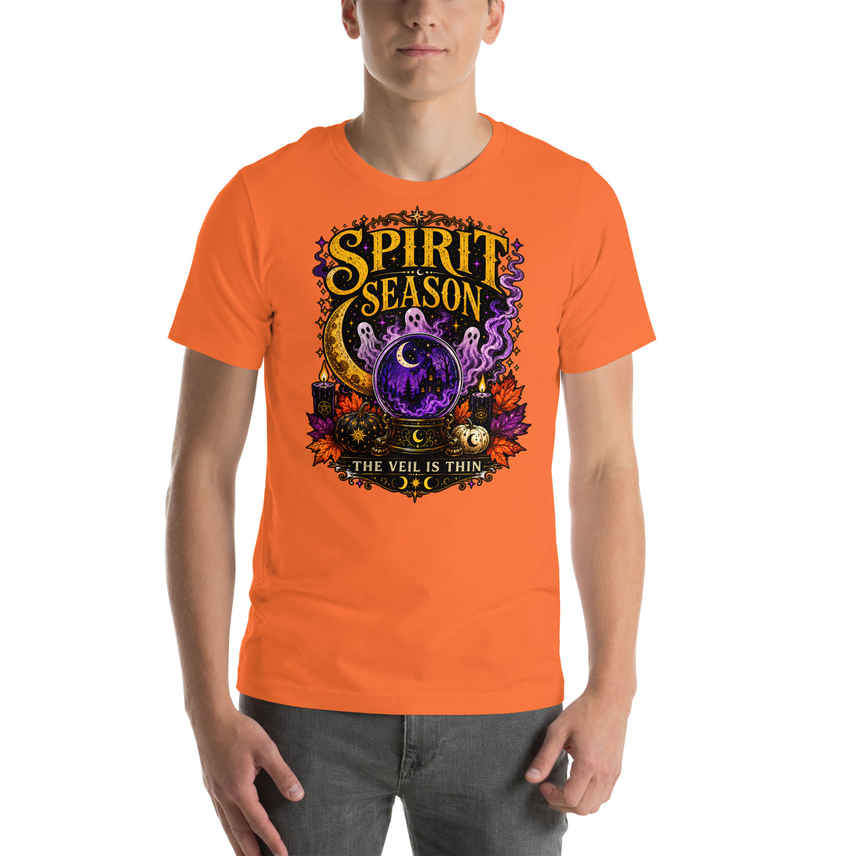 Spirit Season The Veil Is Thin design, three ghosts around a crystal ball, on an orange unisex t-shirt, front view