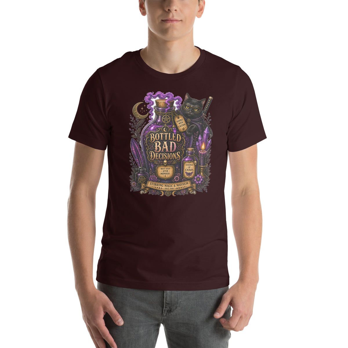 Bottled Bad Decisions whimsigoth design, a black cat and a glowing potion bottle, on an oxblood black unisex t-shirt, front view