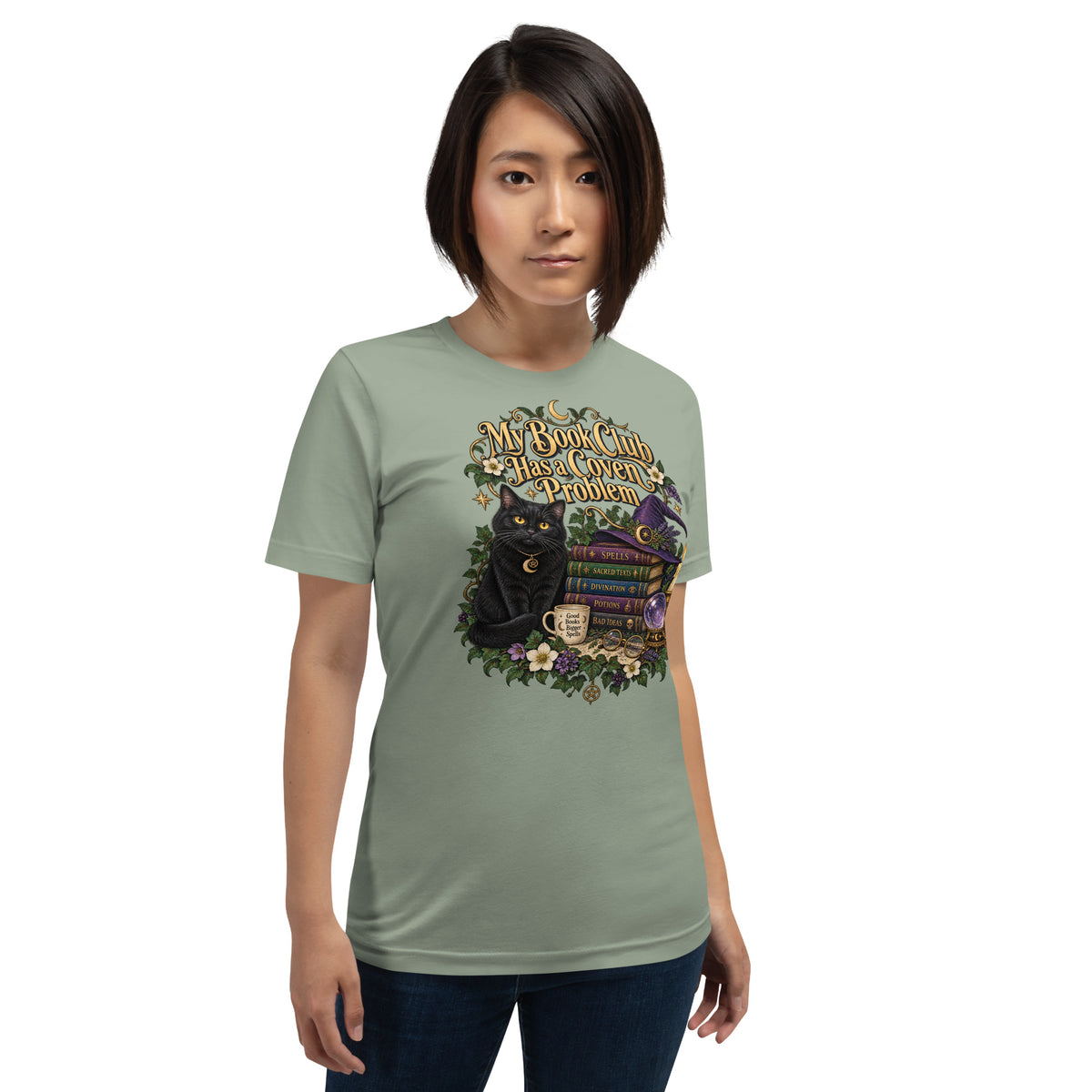 My Book Club Has A Coven Problem dark academia design, a witchy black cat and a stack of spellbooks, on a sage unisex t-shirt, front view