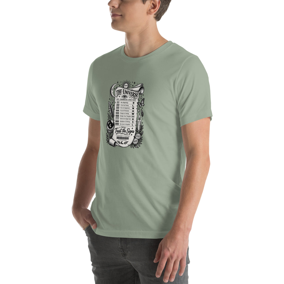 Trust the Signs design, a receipt from the Universe listing the angel numbers and their meanings, with a crystal ball and a candle, on a sage unisex t-shirt, angled left front view