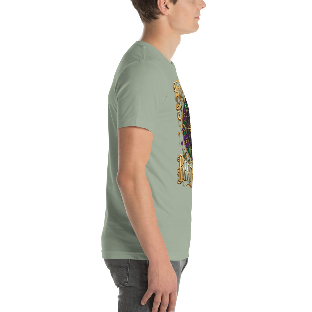 Blame My Birth Chart astrology design, a purple and green zodiac wheel with a gold sun face and crescent moon at its center, hung with gold ornaments, on a sage unisex t-shirt, right side view