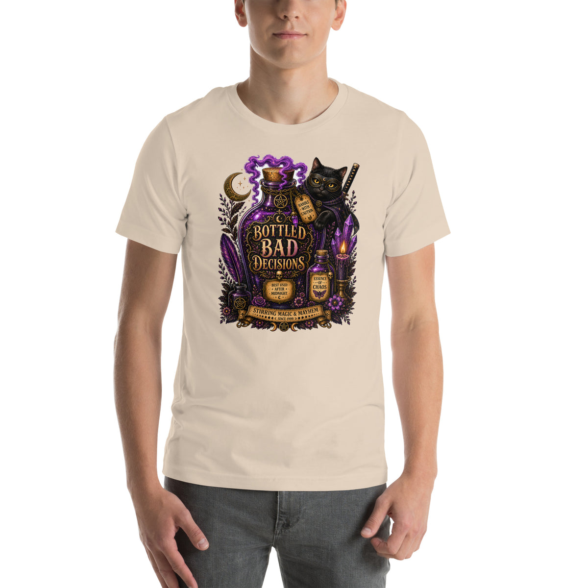 Bottled Bad Decisions whimsigoth design, a black cat and a glowing potion bottle, on a soft cream unisex t-shirt, front view