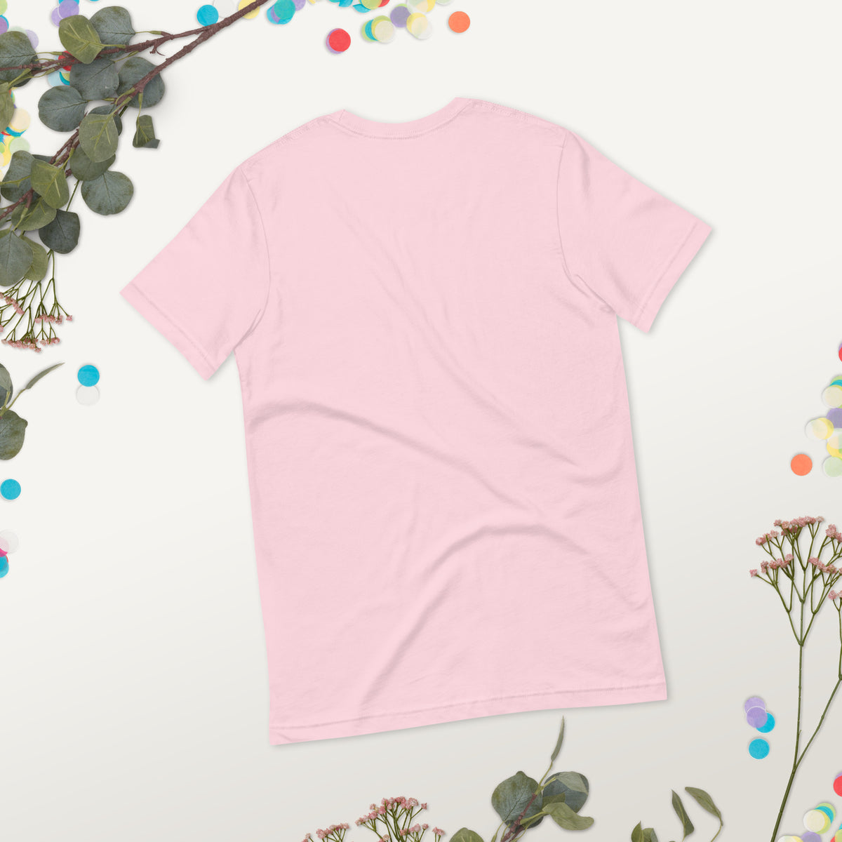 Spirit Whisperer unisex t-shirt in soft pink, back view worn, showing the plain reverse.
