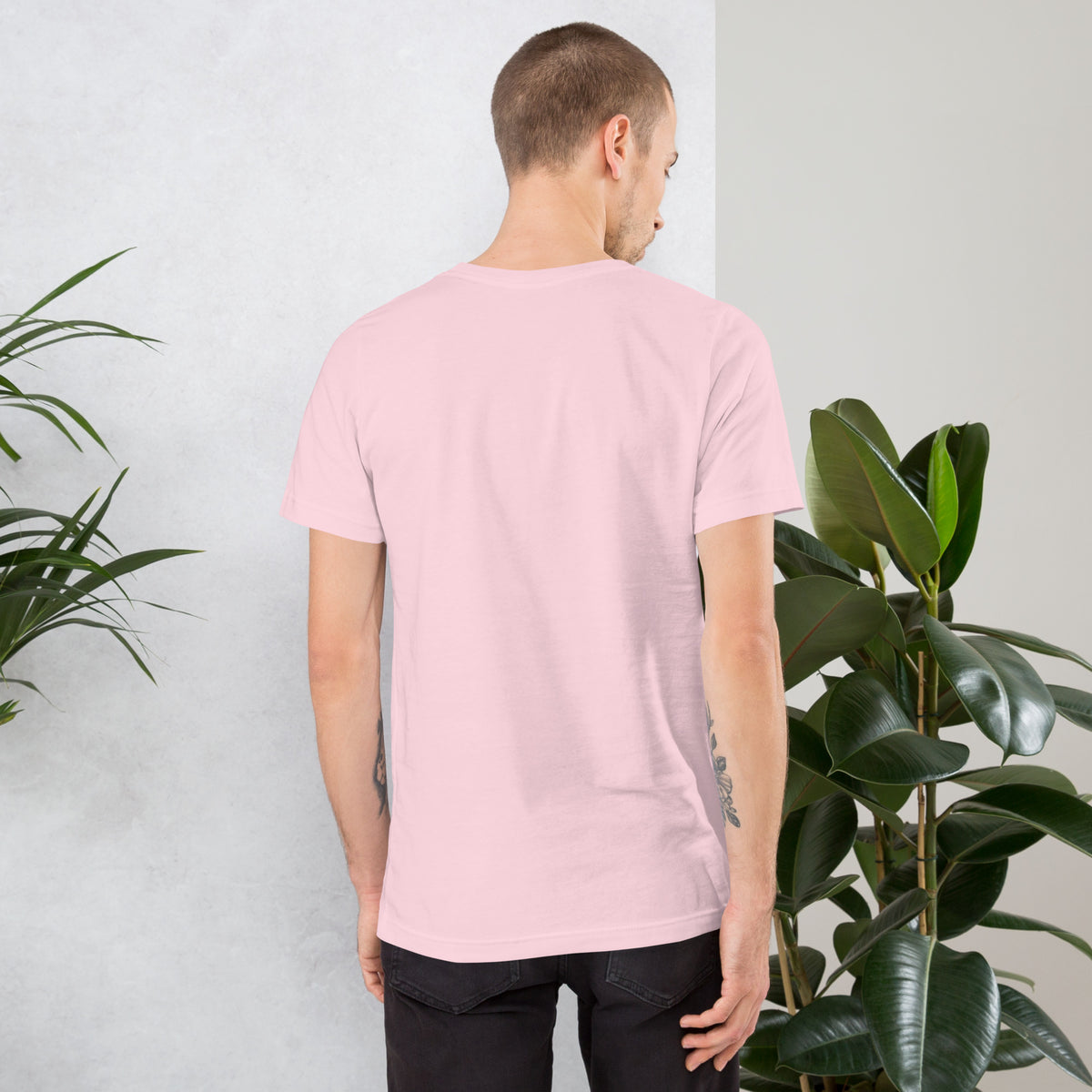 11:11 angel number design, the number set in plain white type above Notice, Align, Receive, on a soft pink unisex t-shirt, back view