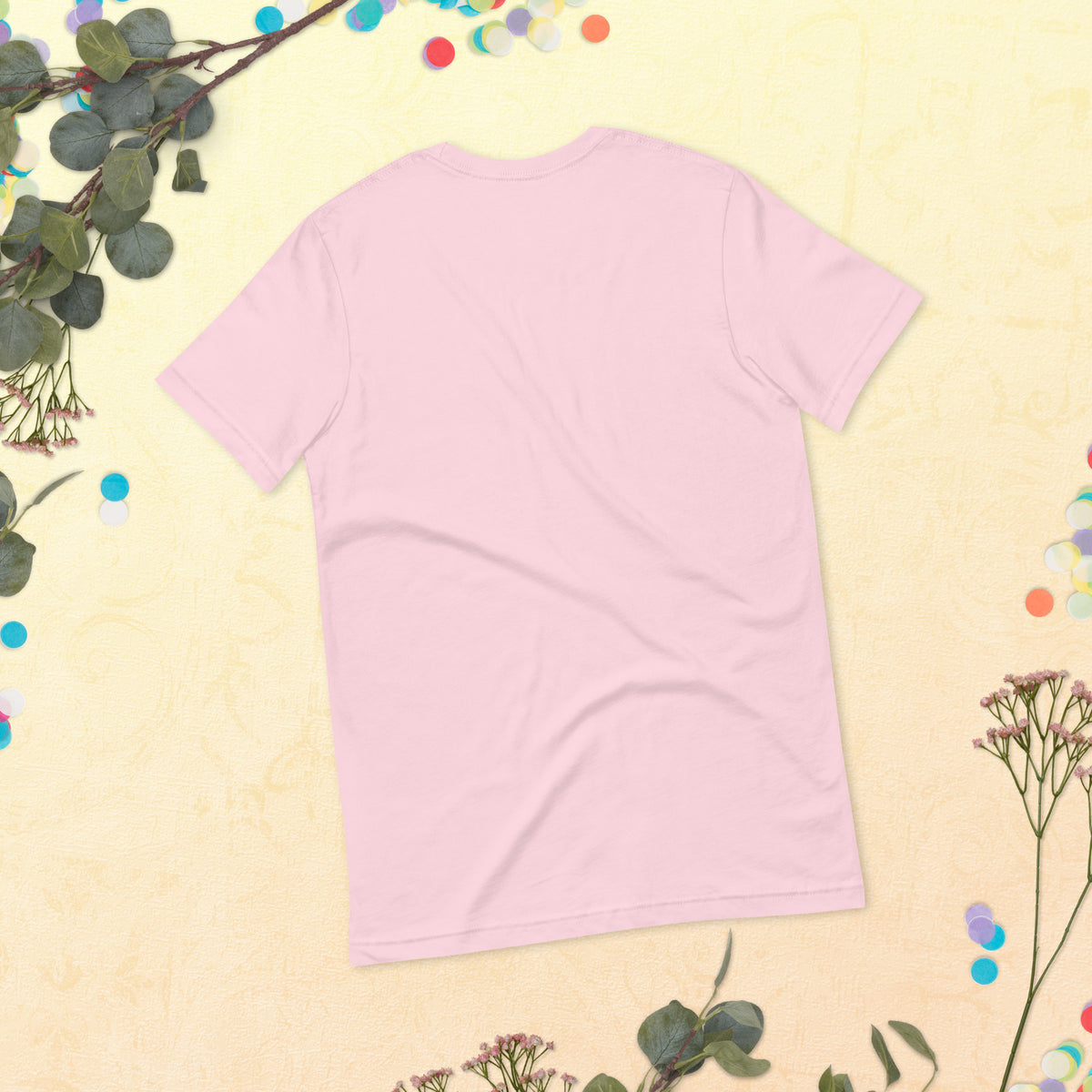 Spirit Whisperer unisex t-shirt in soft pink, back, laid flat, showing the plain reverse.