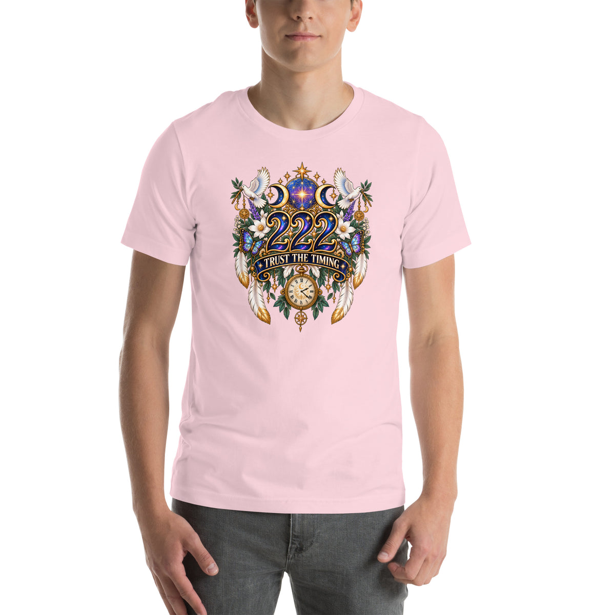 222 Trust The Timing angel number design, two white doves with olive branches, a gold pocket watch and white feathers, on a soft pink unisex t-shirt, front view