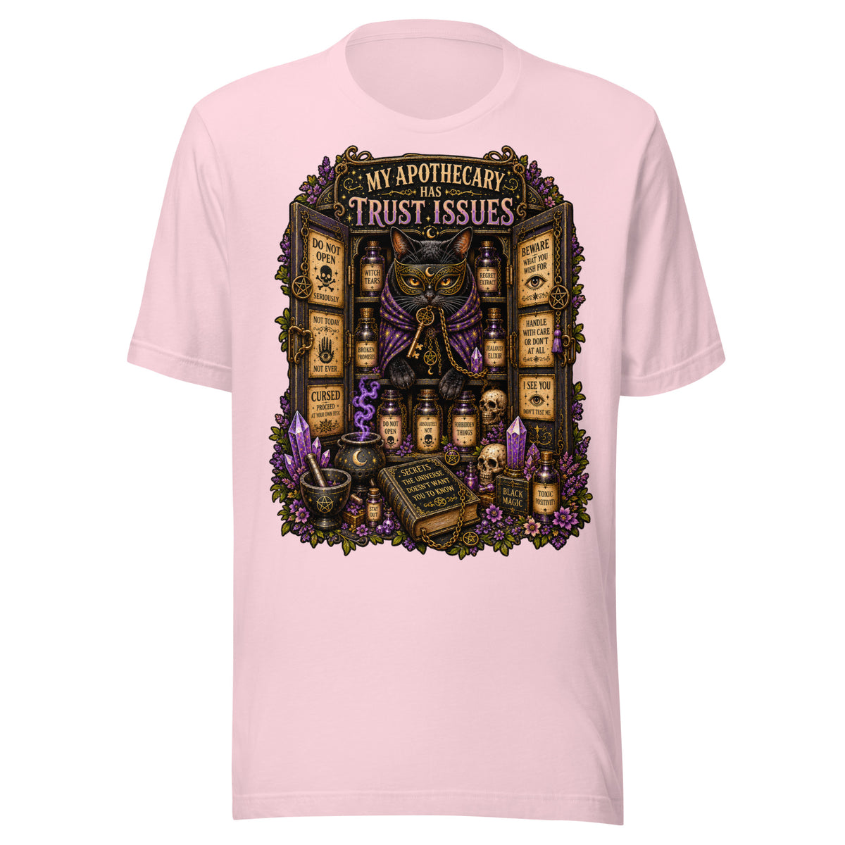 My Apothecary Has Trust Issues design, a masked black cat guarding a cabinet of labeled potions, on a soft pink unisex t-shirt, front view