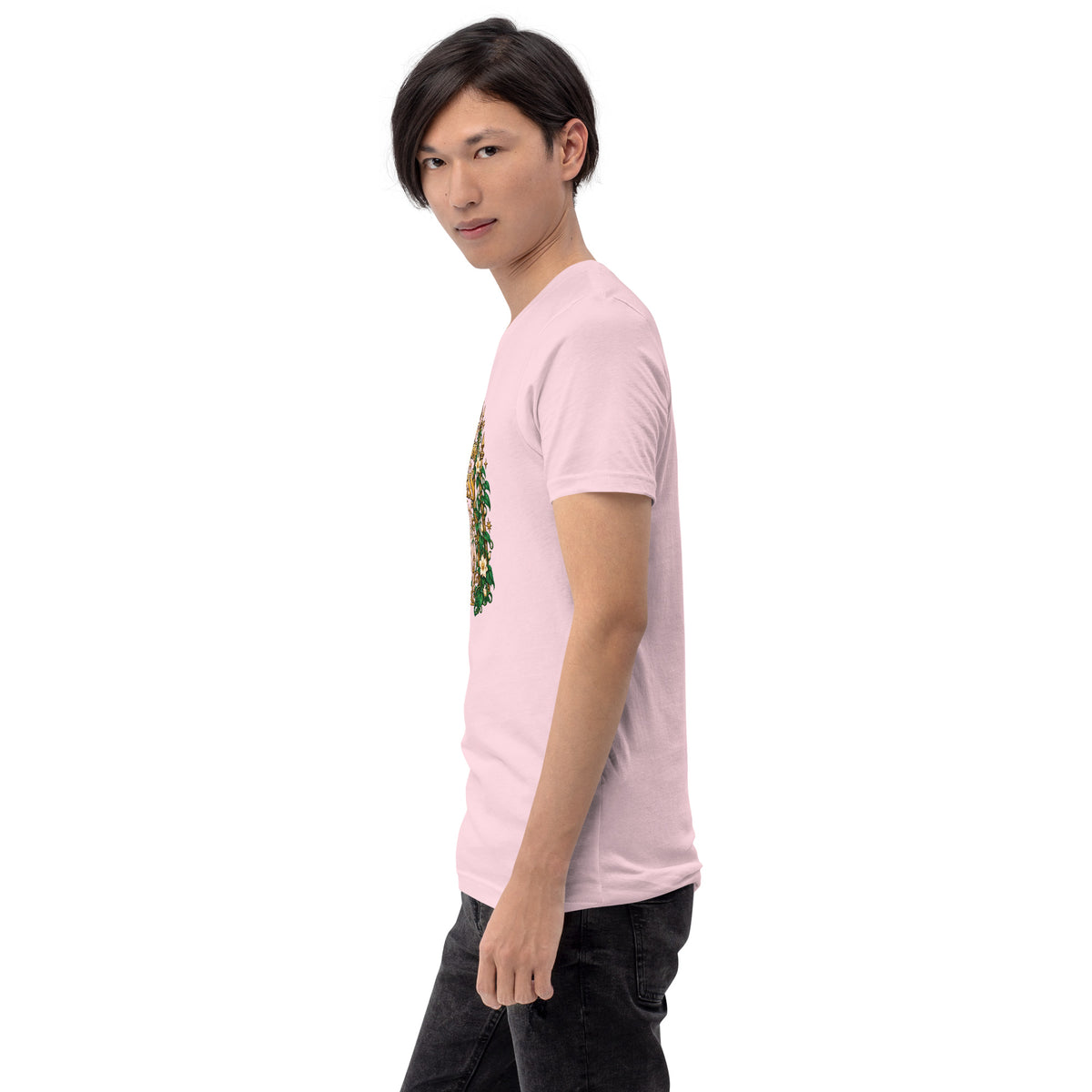 Not Everything Gets Access design, an ornate gold gate framed by ivy and white jasmine, on a soft pink unisex t-shirt worn by a model, left side view