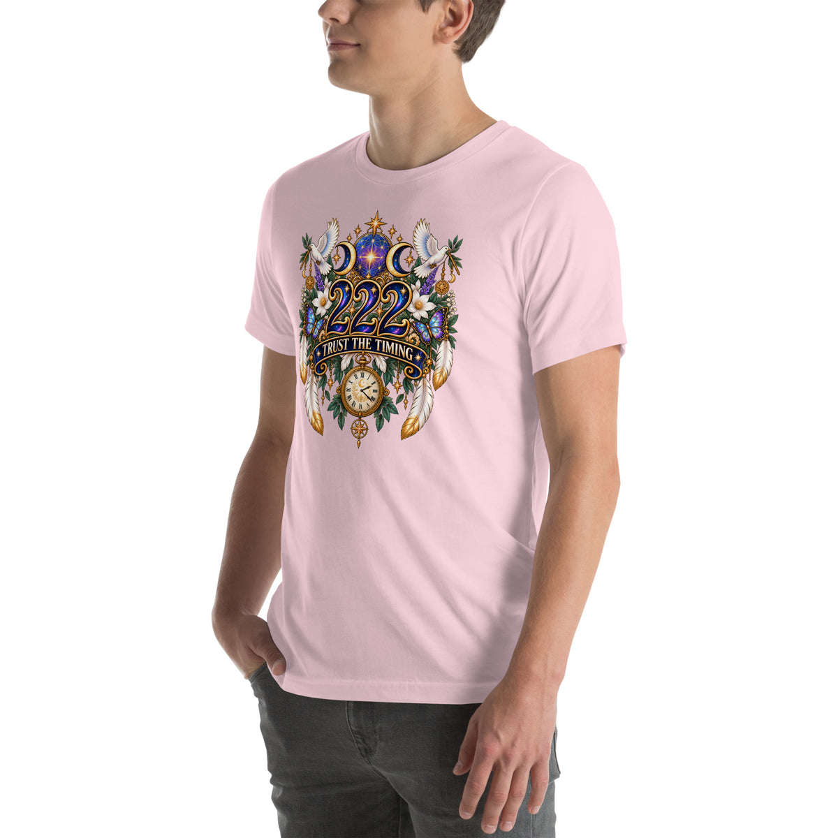 222 Trust The Timing angel number design, two white doves with olive branches, a gold pocket watch and white feathers, on a soft pink unisex t-shirt, left front view