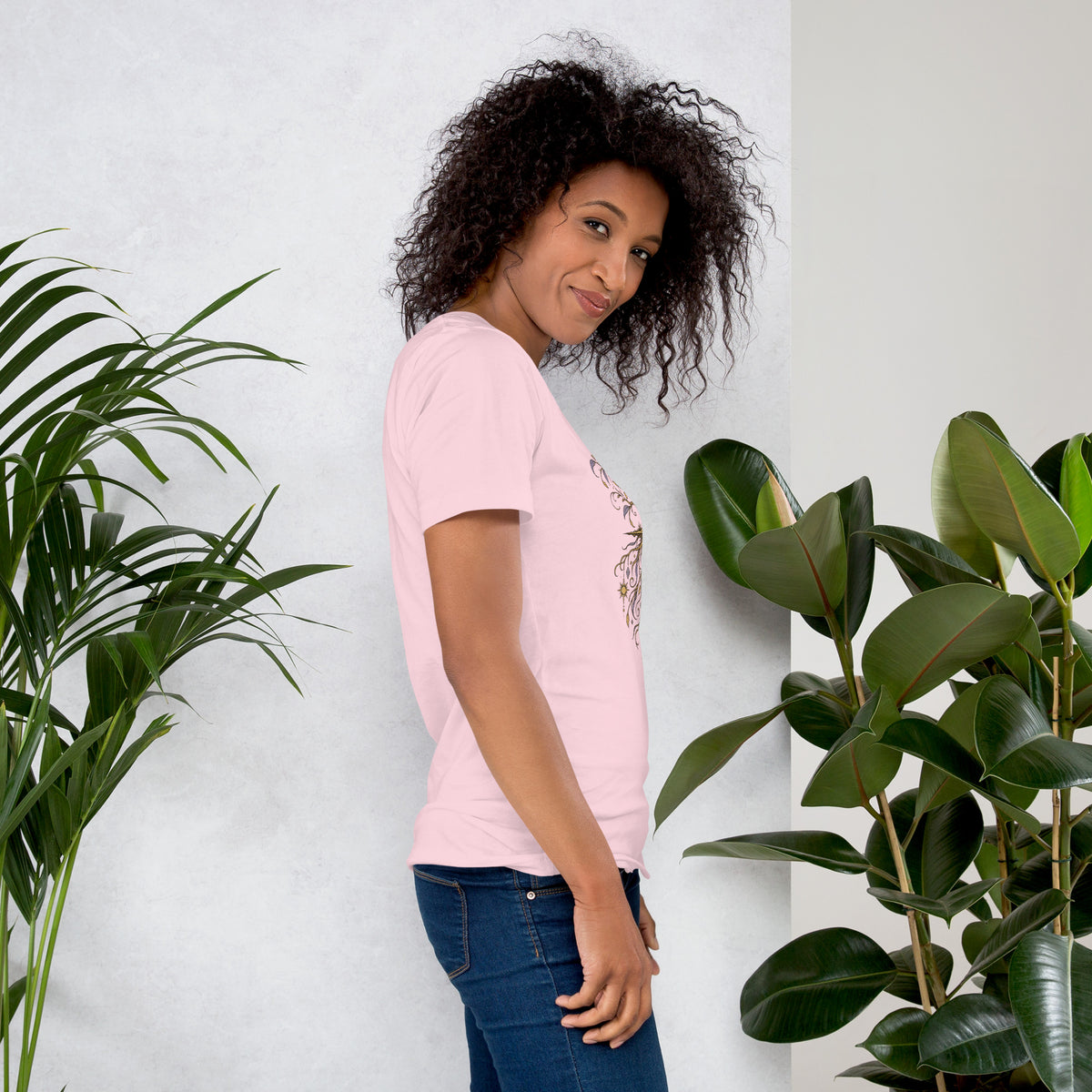 Own Your Grounded Energy design, an ornate tree with gold leaves and crystals in its roots, on a soft pink unisex t-shirt, right side view