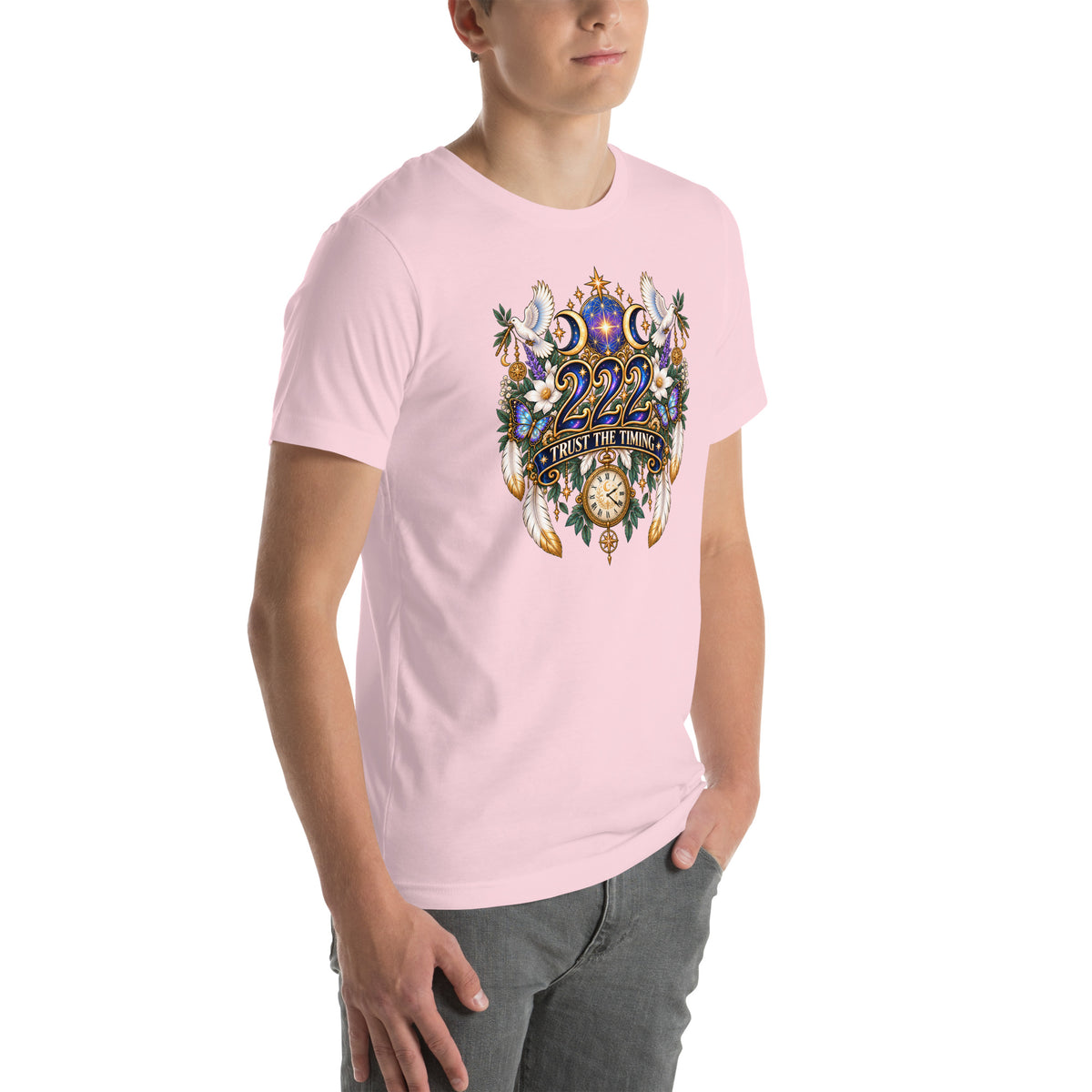 222 Trust The Timing angel number design, two white doves with olive branches, a gold pocket watch and white feathers, on a soft pink unisex t-shirt, right front view