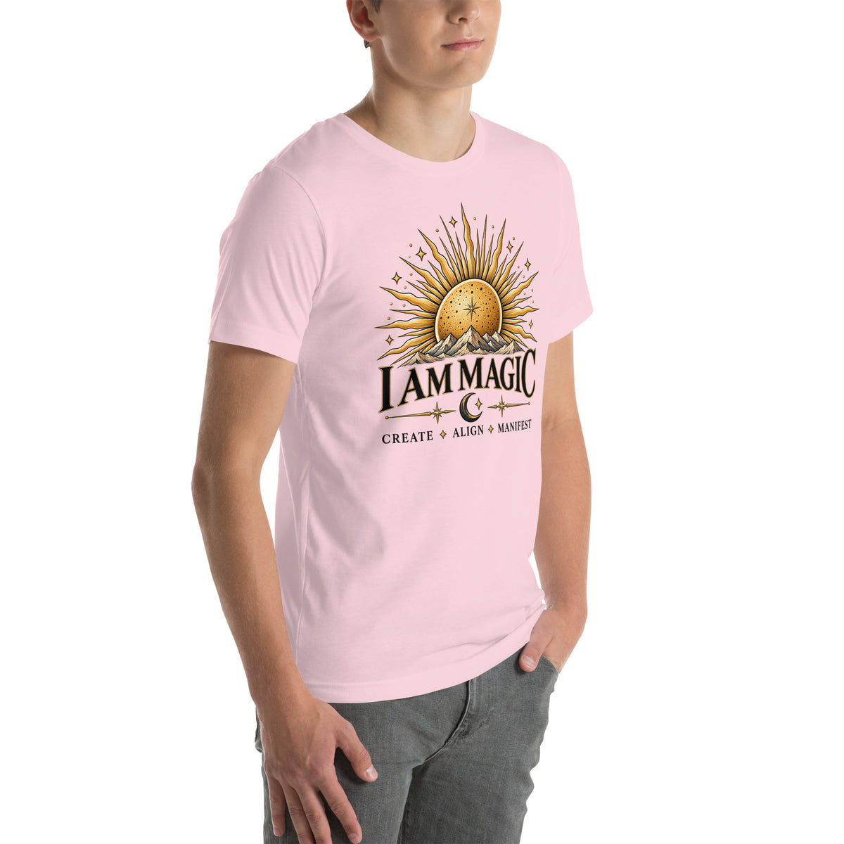 I Am Magic design with a gold sun face, Be Magical collection, on a soft pink unisex t-shirt, angled right front view