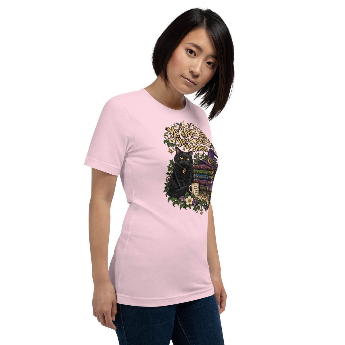 My Book Club Has A Coven Problem dark academia design, a witchy black cat and a stack of spellbooks, on a soft pink unisex t-shirt, right front view