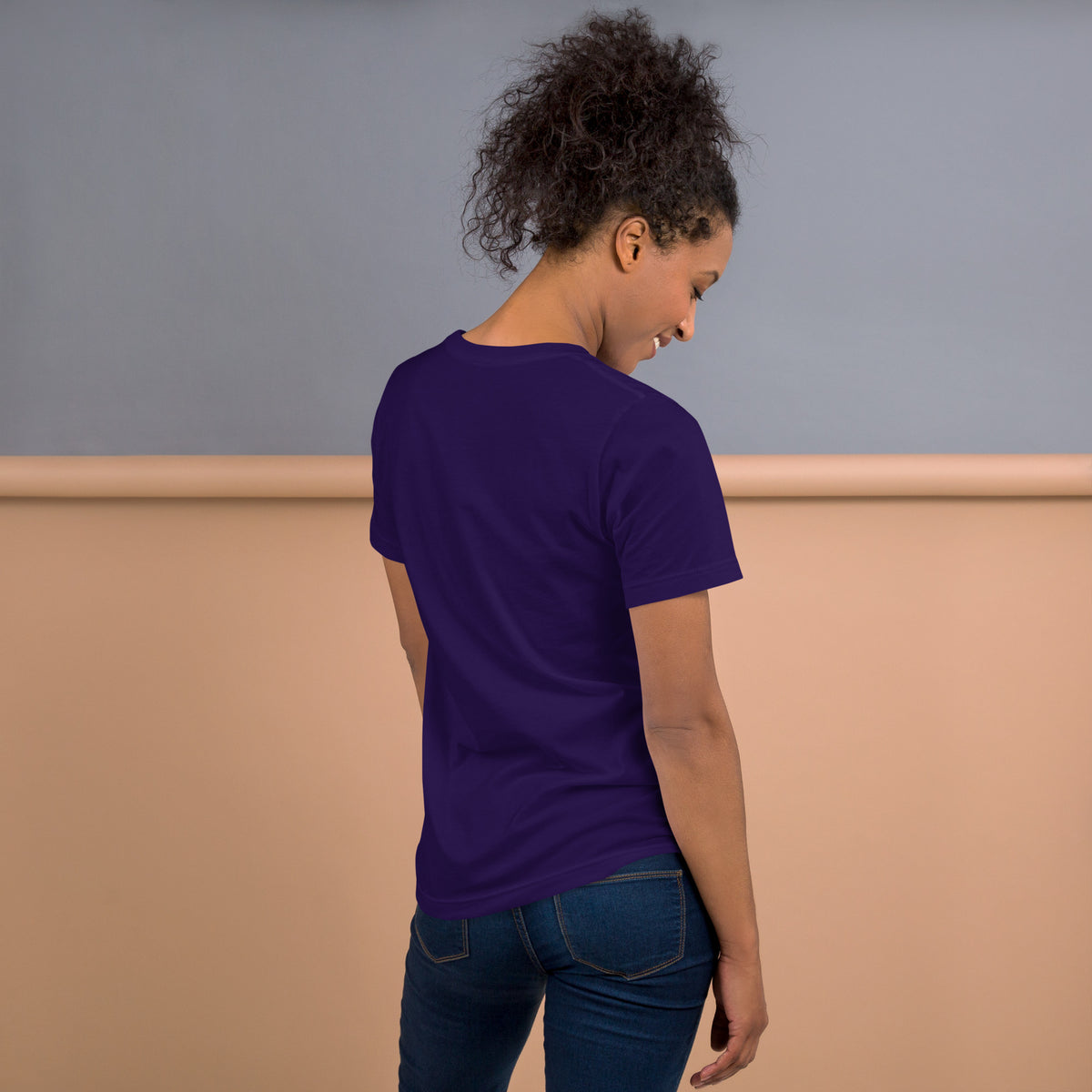 444 Spirit Has My Back angel number design, angel wings flanking the number beneath a galaxy orb and crescent moons, on a team purple unisex t-shirt, back view