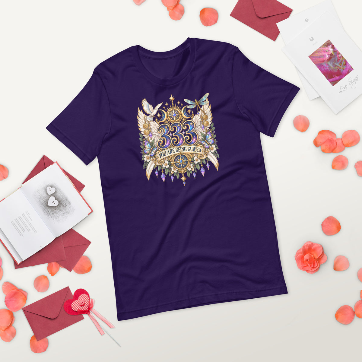 333 You Are Being Guided angel number design, a white dove, angel wings, a dragonfly and a compass rose, on a team purple unisex t-shirt, front view, alternate shot