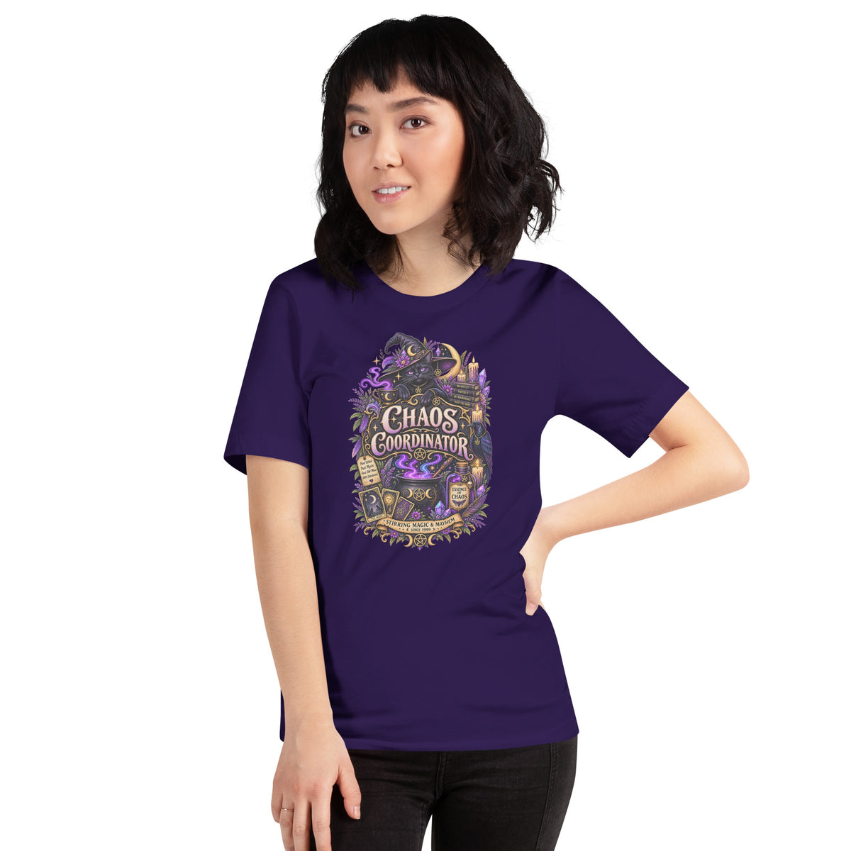 Chaos Coordinator whimsigoth design, a witchy black cat in a pointed hat, on a team purple unisex t-shirt, front view
