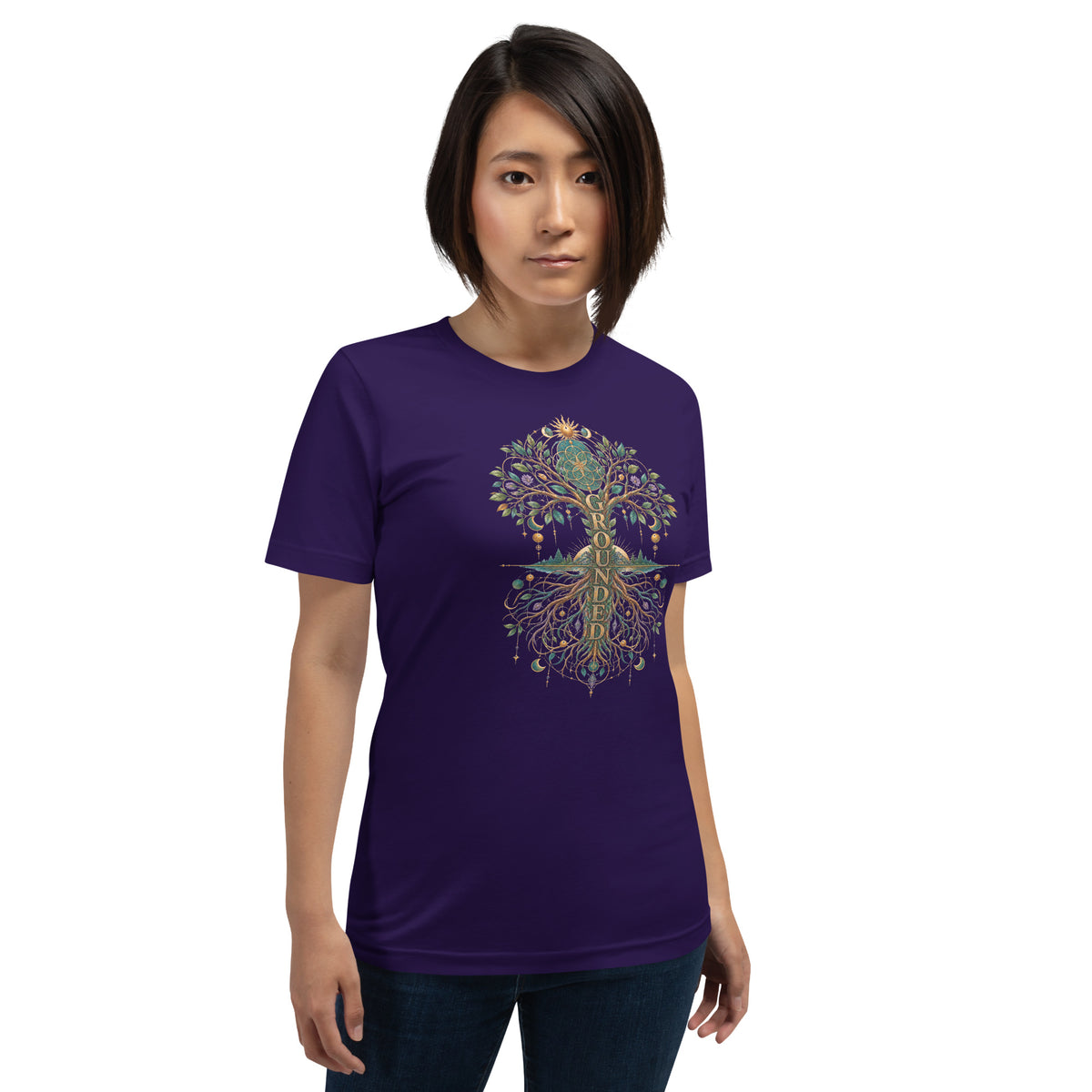 Grounded unisex t-shirt in team purple, front, worn. An art nouveau tree of life with roots mirroring the branches.