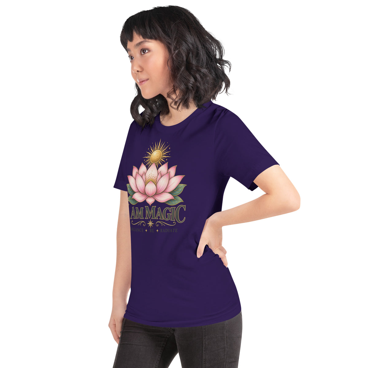 I Am Magic design with a gold lotus, Be Magical collection, on a team purple unisex t-shirt, angled left front view