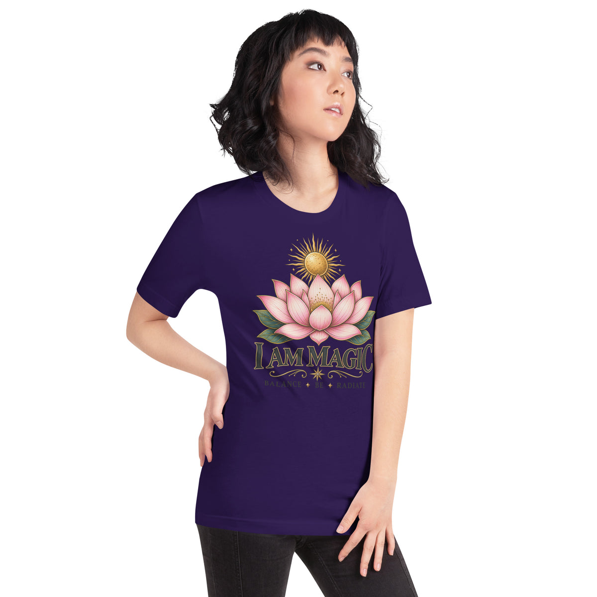 I Am Magic design with a gold lotus, Be Magical collection, on a team purple unisex t-shirt, angled right front view