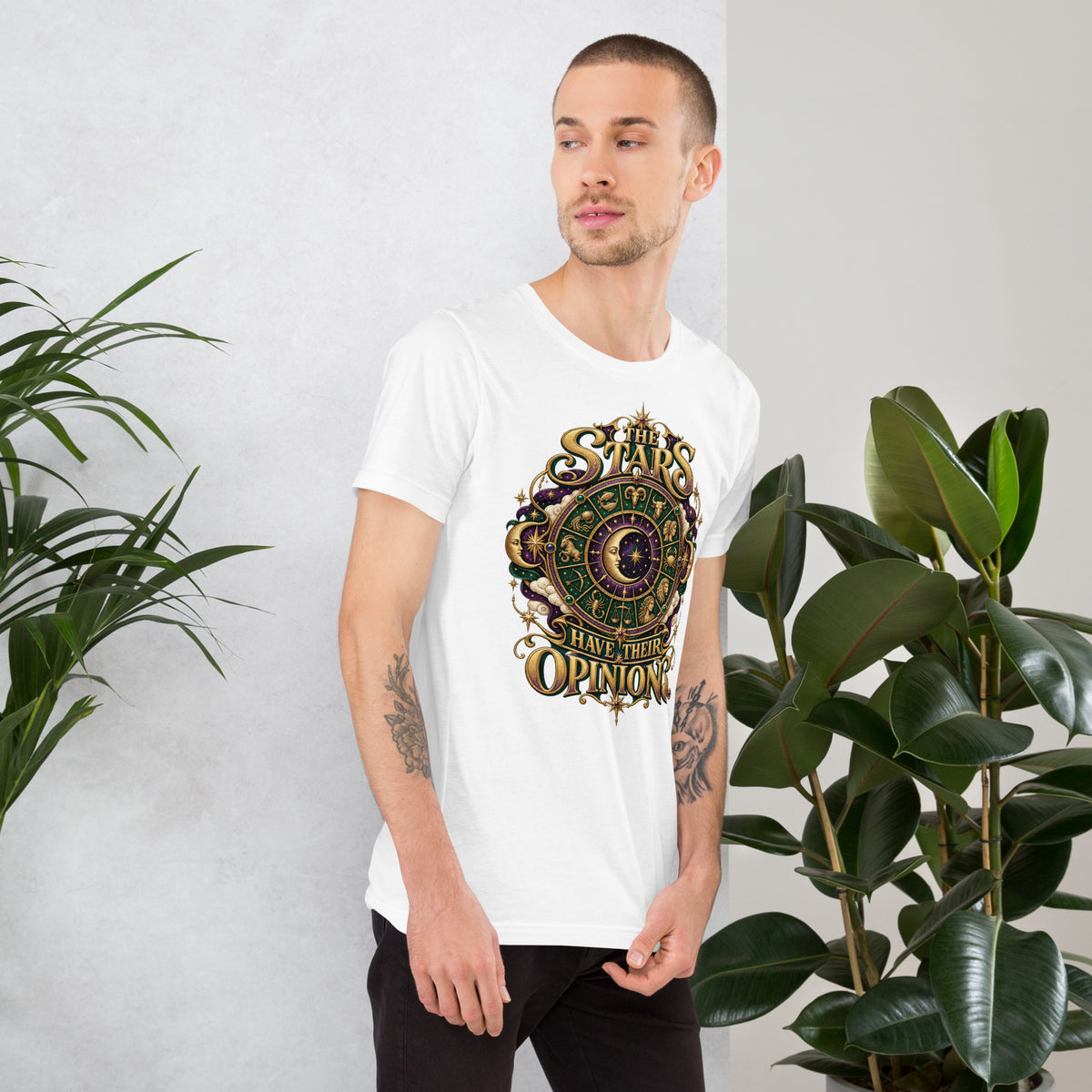 The Stars Have Their Opinions astrology design, a green and purple zodiac wheel of pictorial star signs with a crescent moon and sun face at its center, framed by clouds and gold lettering, on a white unisex t-shirt, right view