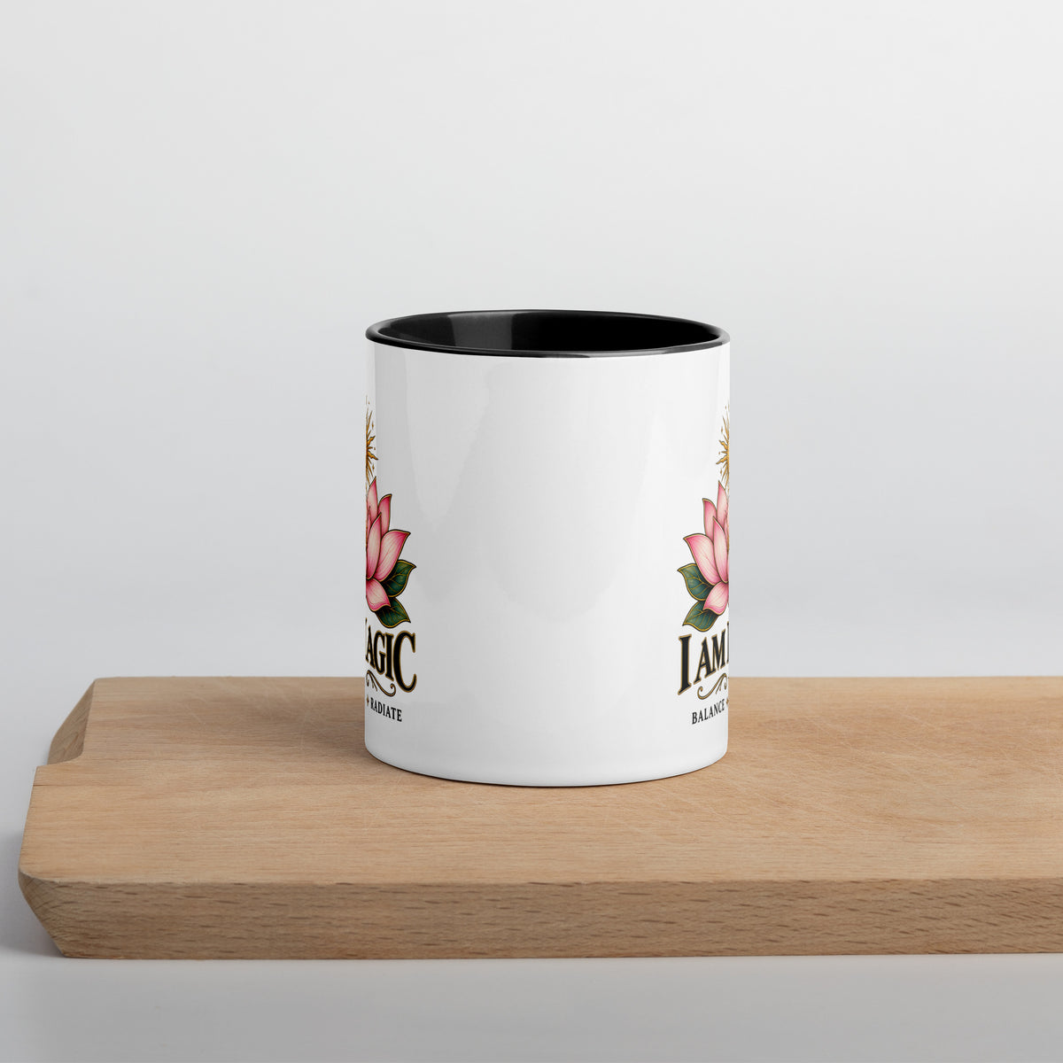 I Am Magic design with a gold lotus, Be Magical collection, on a white ceramic mug with a black interior, 11 oz, front view