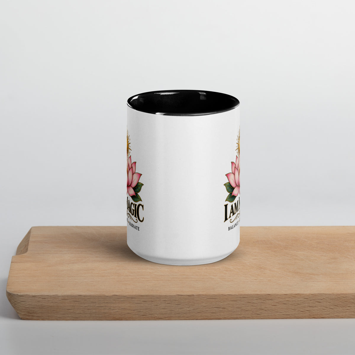 I Am Magic design with a gold lotus, Be Magical collection, on a white ceramic mug with a black interior, 15 oz, front view
