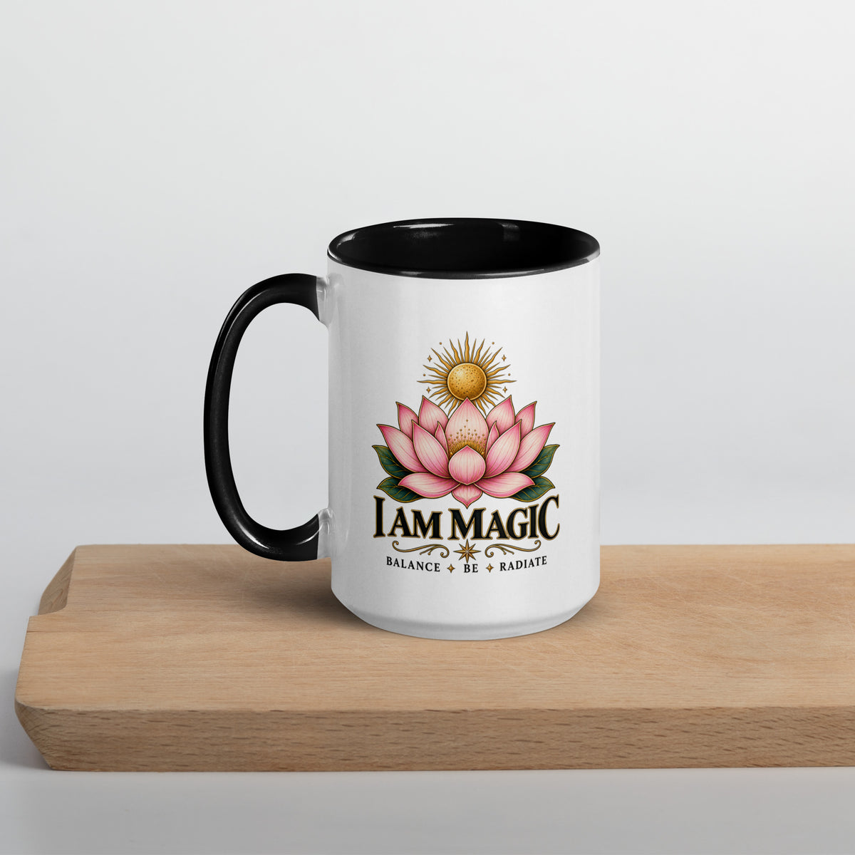I Am Magic design with a gold lotus, Be Magical collection, on a white ceramic mug with a black interior, 15 oz, left side view