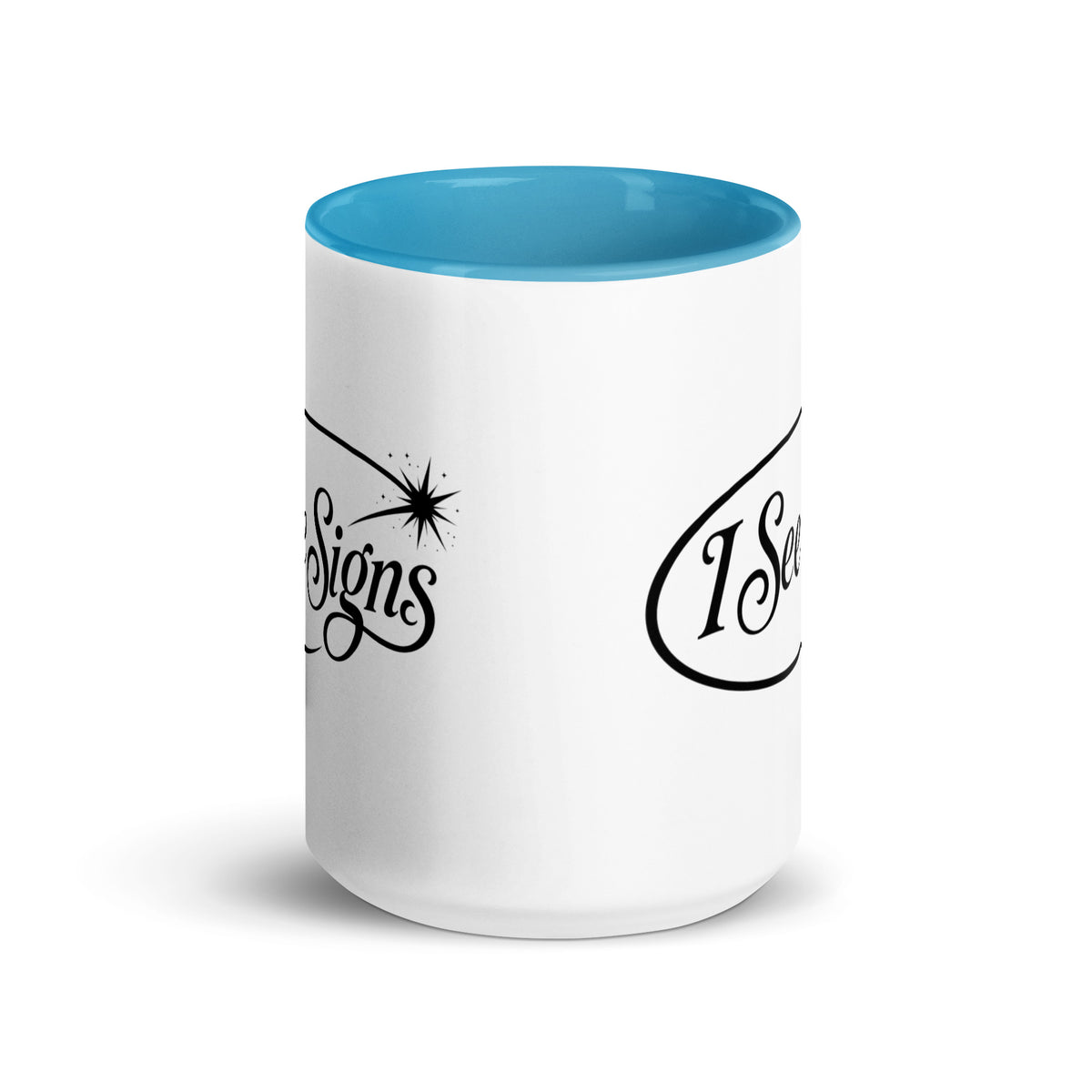 I See Signs design, the words set in black script inside a thin oval with a four-pointed star, on a white ceramic mug with a blue interior, 15 oz, front view