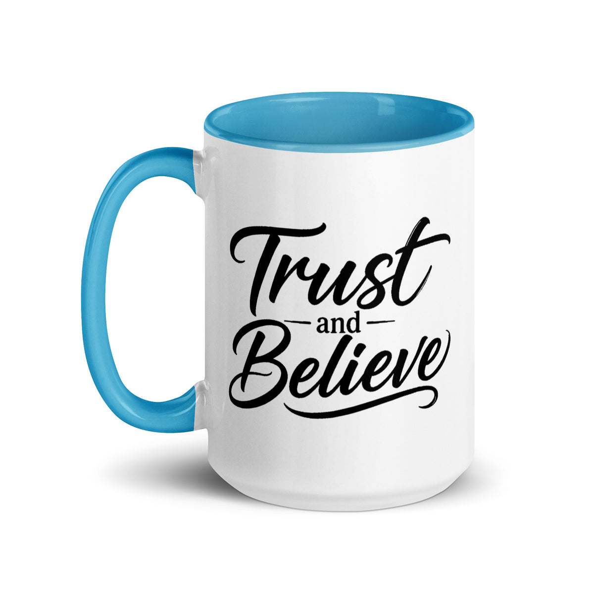 Trust and Believe design, on a white ceramic mug with a blue interior, 15 oz, left side view