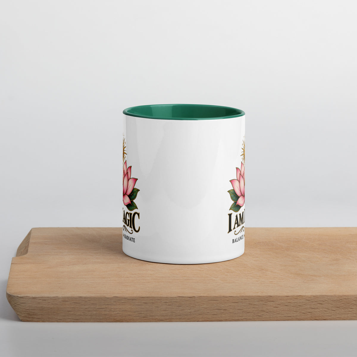 I Am Magic design with a gold lotus, Be Magical collection, on a white ceramic mug with a dark green interior, 11 oz, front view