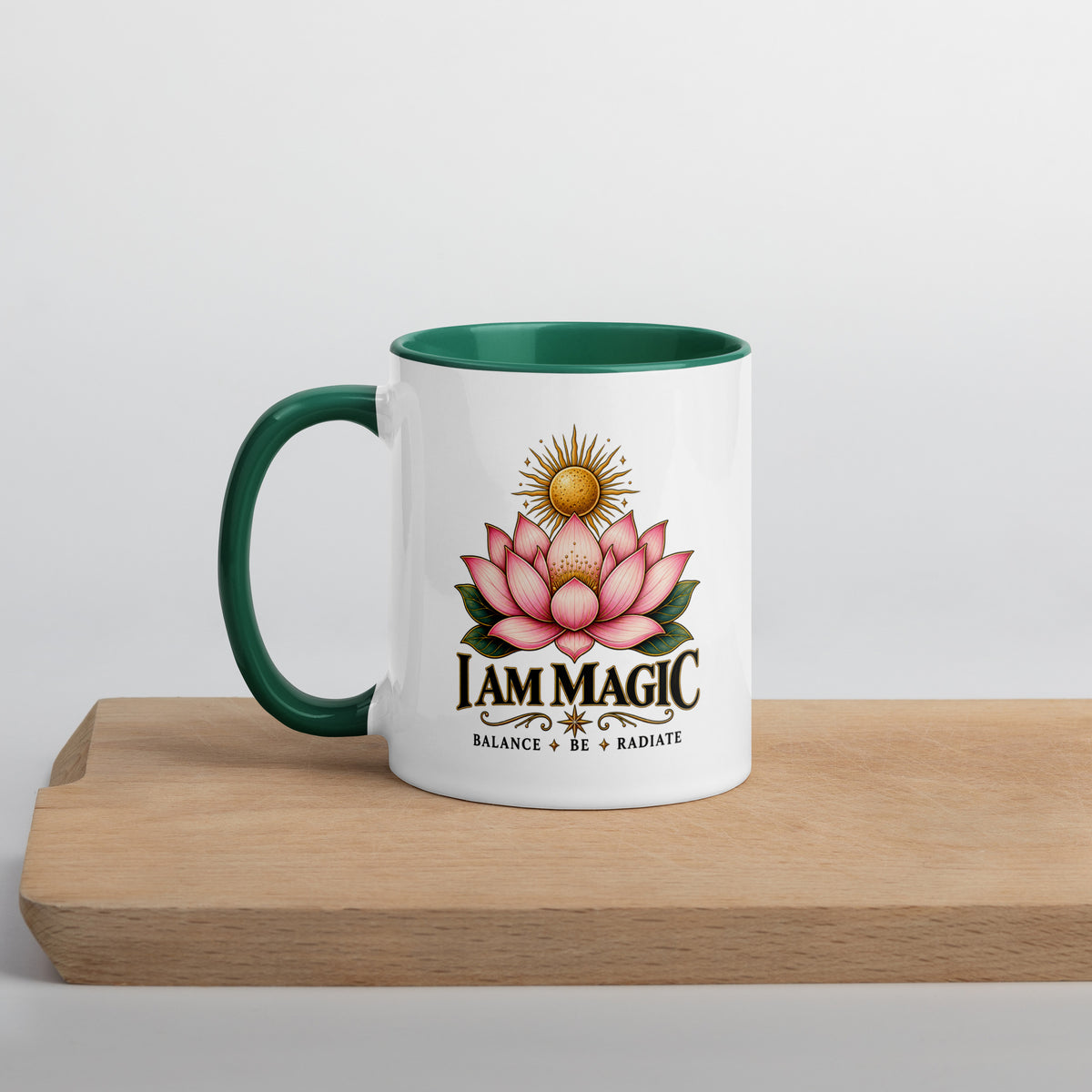 I Am Magic design with a gold lotus, Be Magical collection, on a white ceramic mug with a dark green interior, 11 oz, left side view