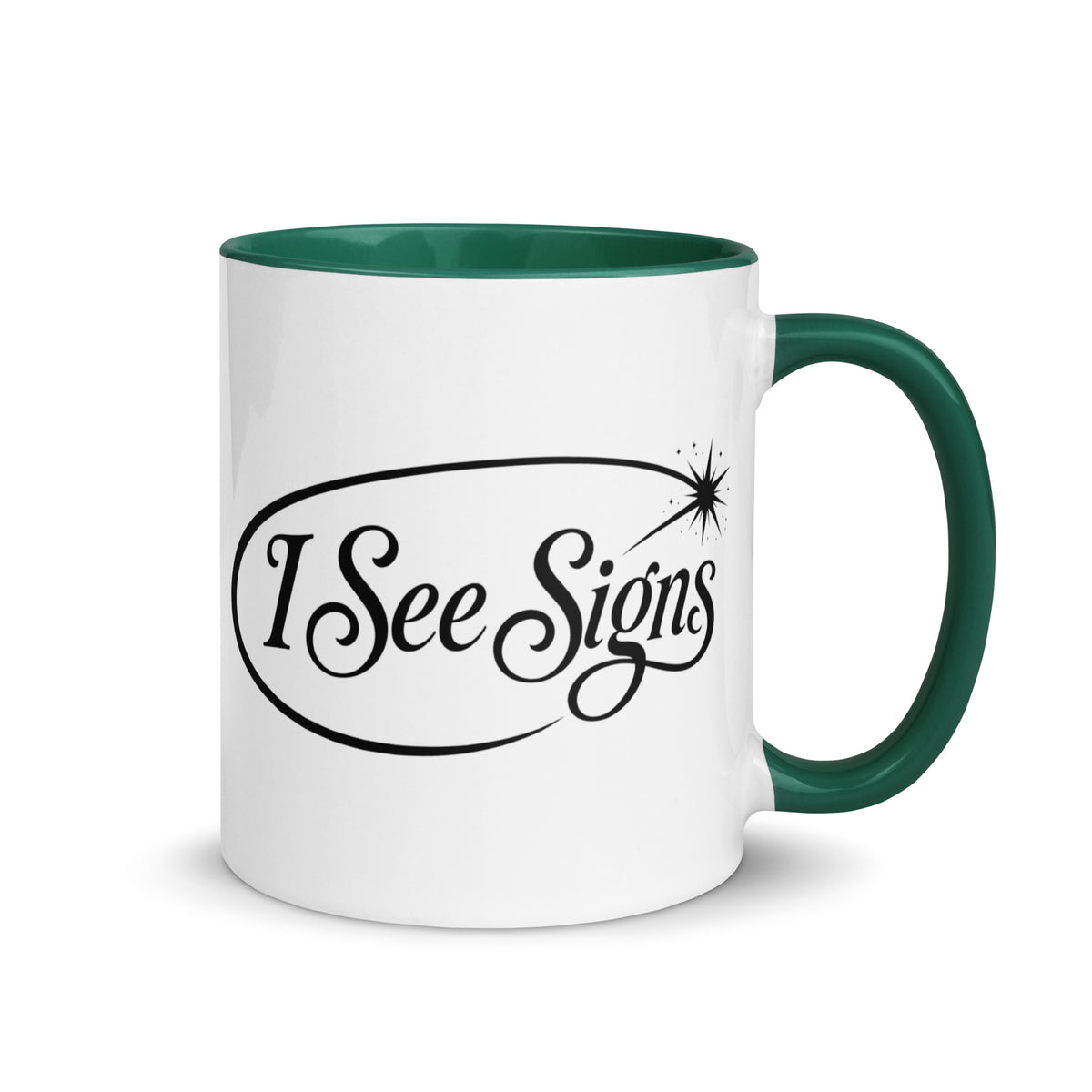 I See Signs design, the words set in black script inside a thin oval with a four-pointed star, on a white ceramic mug with a dark green interior, 11 oz, right side view