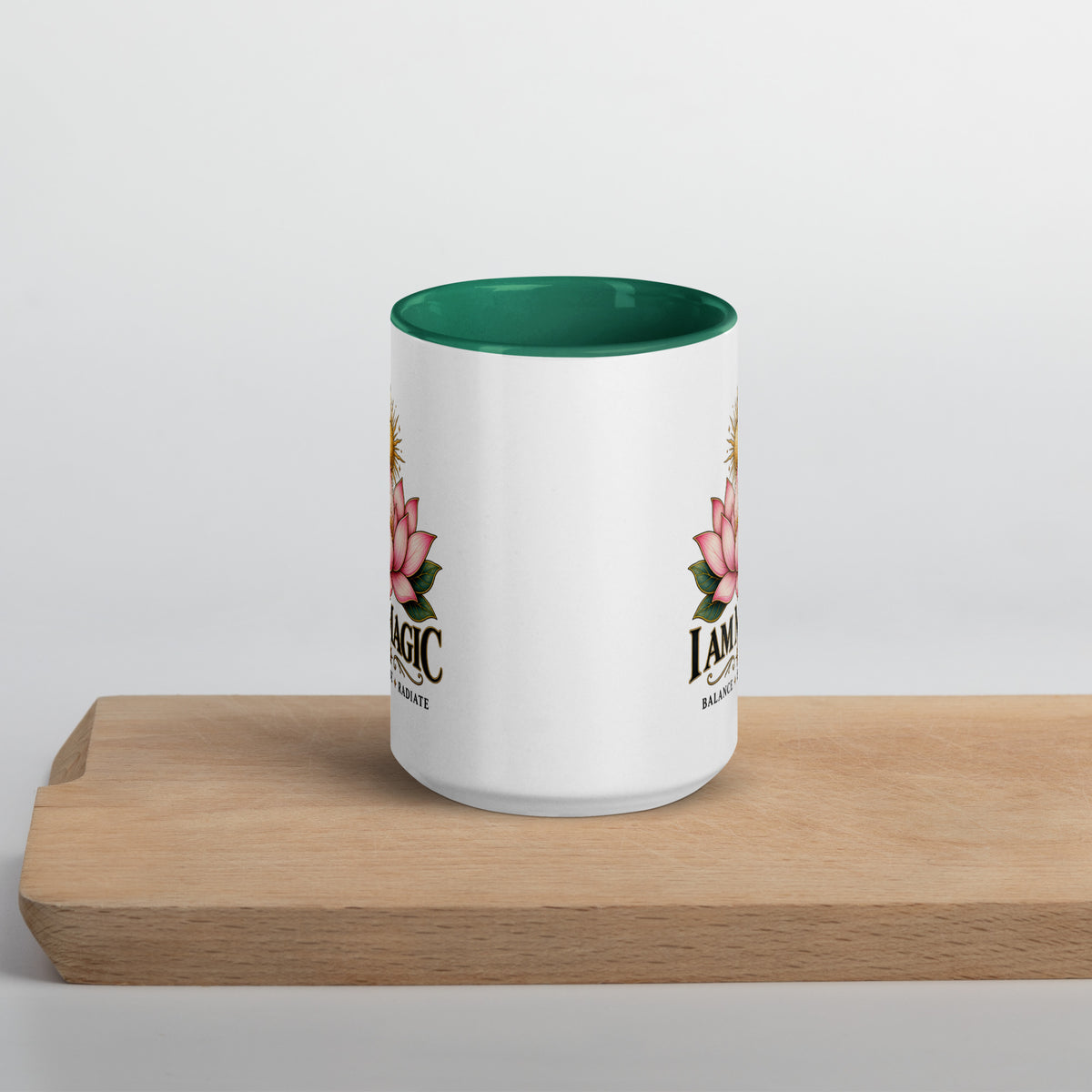 I Am Magic design with a gold lotus, Be Magical collection, on a white ceramic mug with a dark green interior, 15 oz, front view