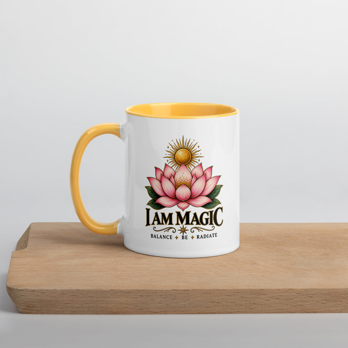 I Am Magic design with a gold lotus, Be Magical collection, on a white ceramic mug with a golden yellow interior, 11 oz, left side view