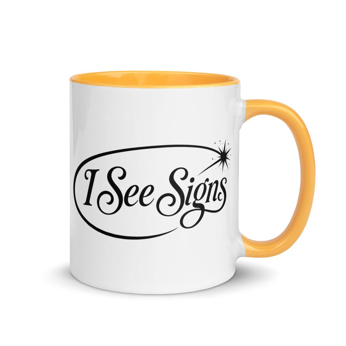 I See Signs design, the words set in black script inside a thin oval with a four-pointed star, on a white ceramic mug with a golden yellow interior, 11 oz, right side view