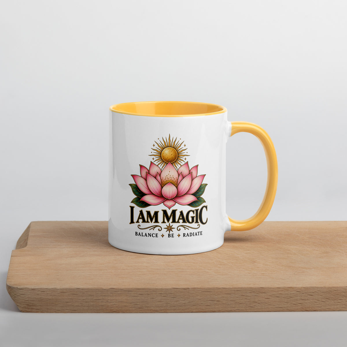 I Am Magic design with a gold lotus, Be Magical collection, on a white ceramic mug with a golden yellow interior, 11 oz, right side view