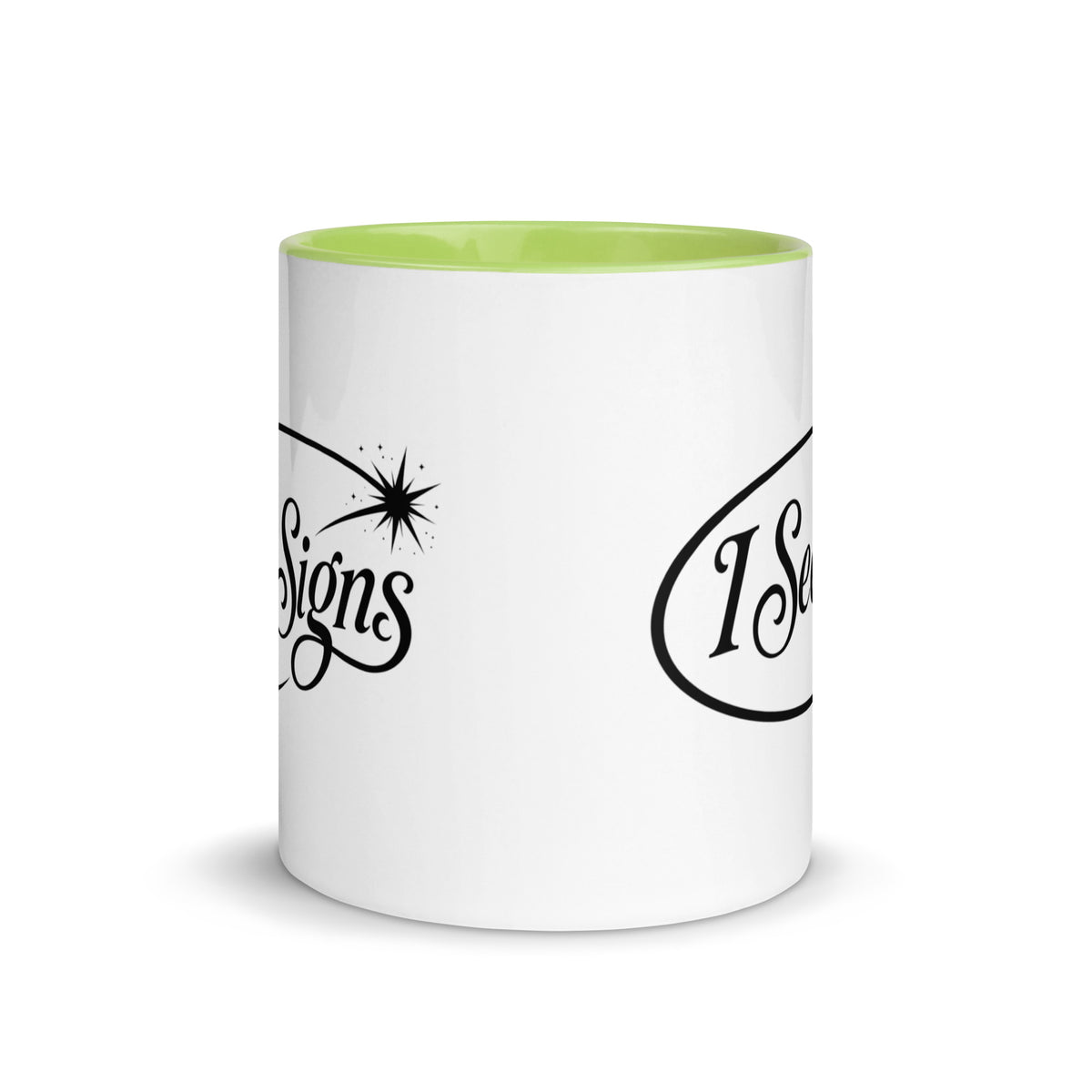 I See Signs design, the words set in black script inside a thin oval with a four-pointed star, on a white ceramic mug with a green interior, 11 oz, front view