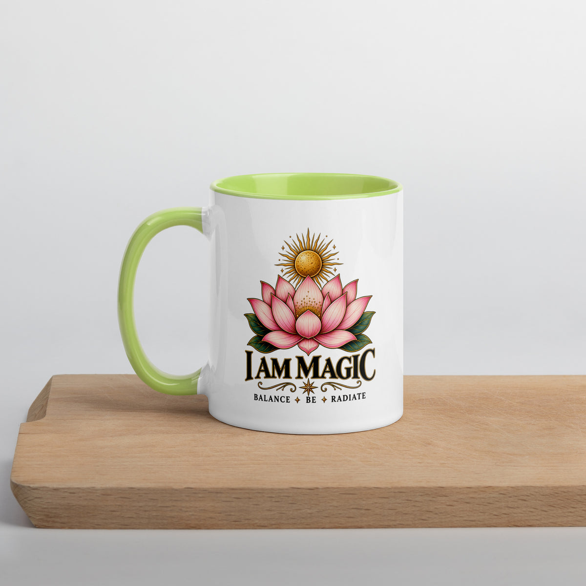 I Am Magic design with a gold lotus, Be Magical collection, on a white ceramic mug with a green interior, 11 oz, left side view
