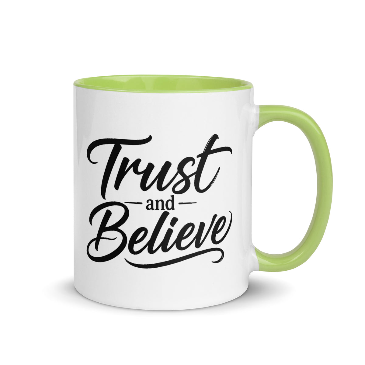 Trust and Believe design, on a white ceramic mug with a green interior, 11 oz, right side view