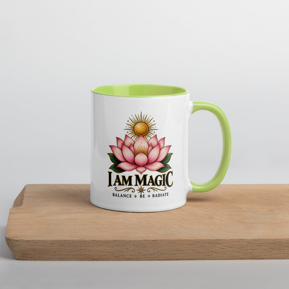I Am Magic design with a gold lotus, Be Magical collection, on a white ceramic mug with a green interior, 11 oz, right side view